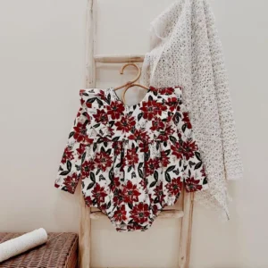 red floral baby bubble romper long sleeve ruffle detail