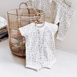 spotted print baby romper short sleeve front snaps white tan